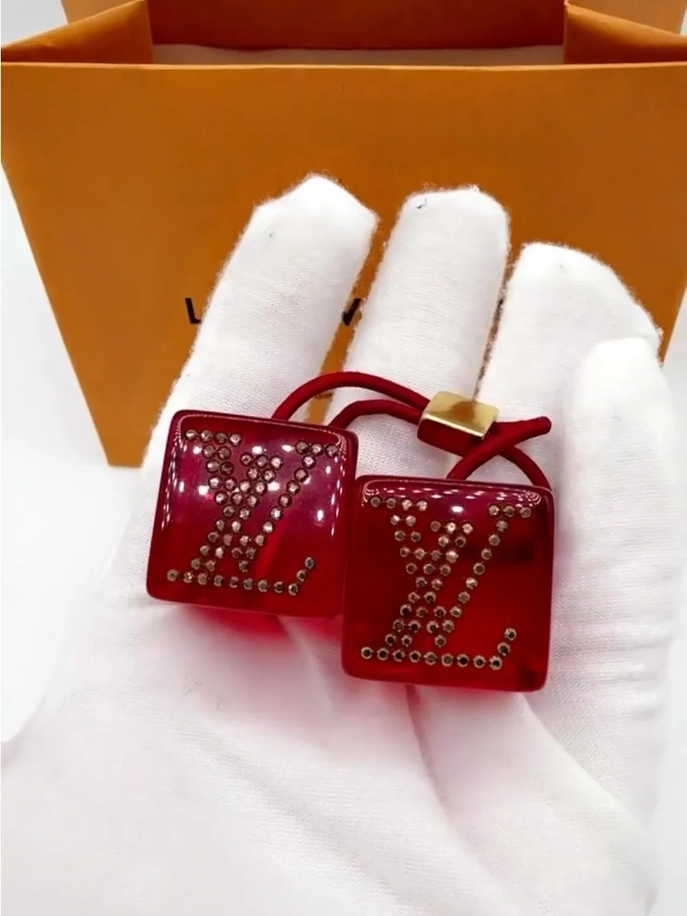 Louis Vuitton Red Logo Cube Hair Tie with Gold Accents - Picture 2 of 10
